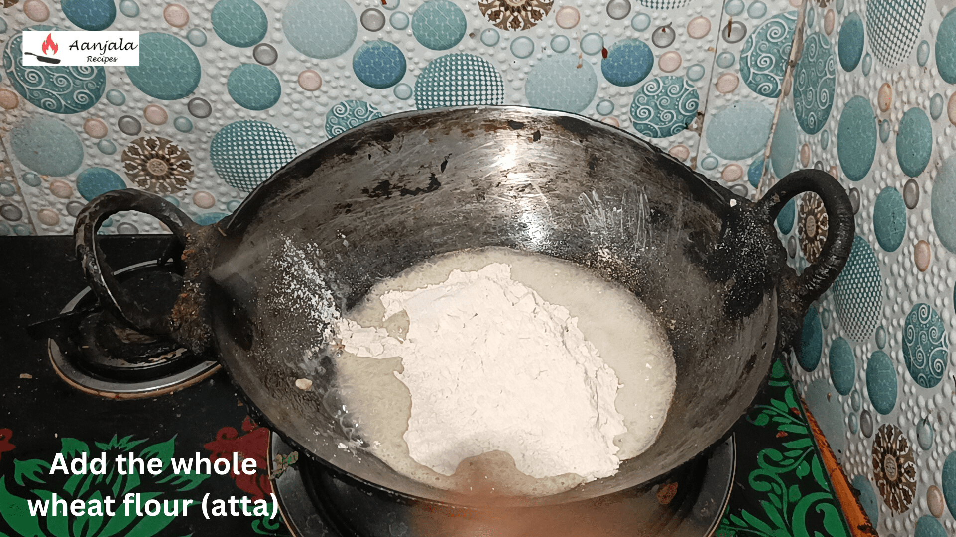 Add the whole wheat flour (atta)